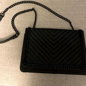 Black purse with chain detail